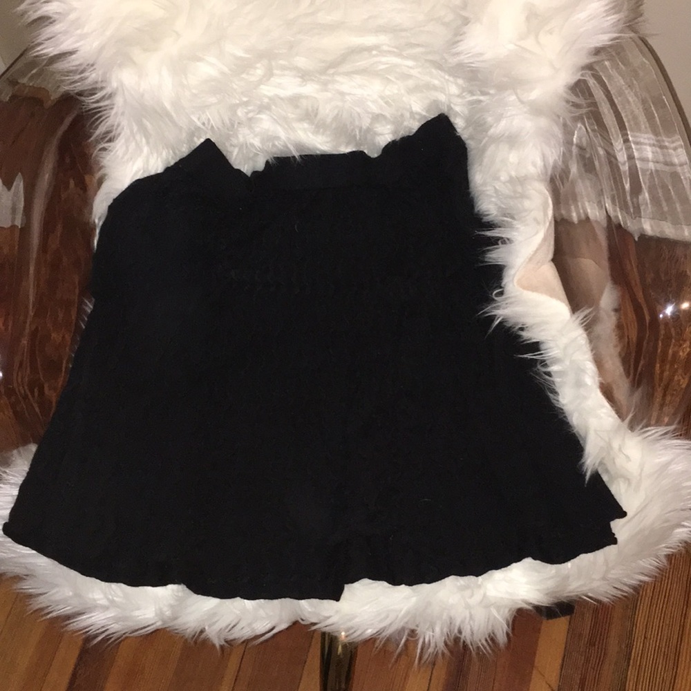 Textured black mini skirt